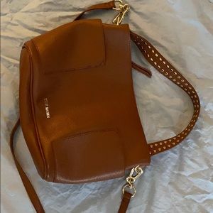 Shoulder bag with arm strap.